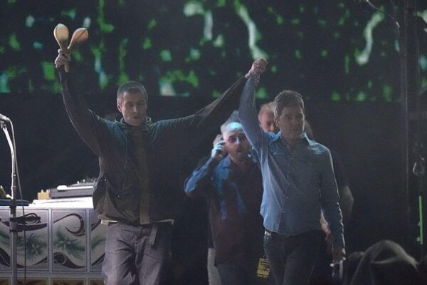 Britpop rockers Oasis reunite for first concert in 16 years