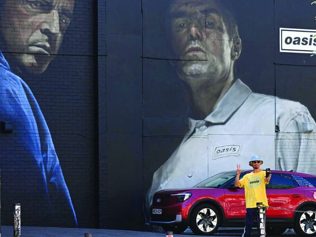 oasis has five sold out shows in its home city photo afp