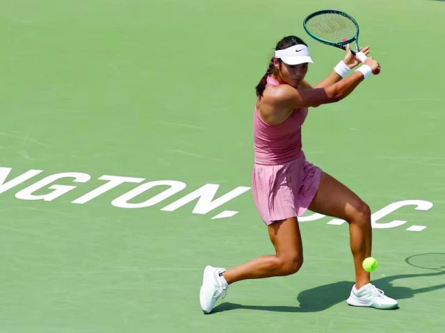 emma raducanu hits a backhand against naomi osaka in a women s singles match of dc open at rock creek park tennis center photo afp