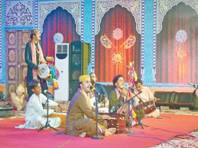folk singers perform at bhit shah photo app