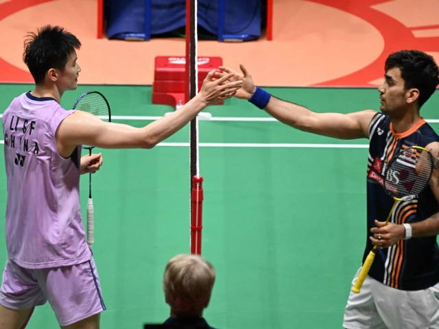 china s li shifeng l is congratulated by india s lakshya sen after winning their men s singles final match during the hong kong open photo afp