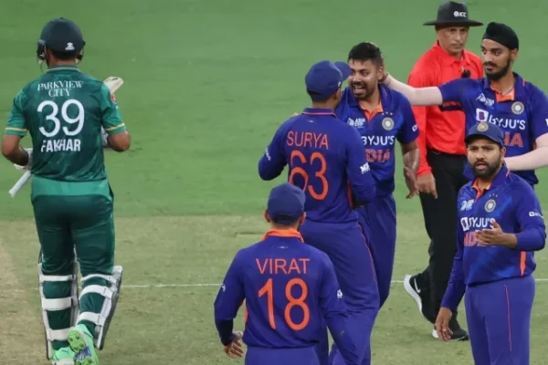 avesh khan celebrates with teammates after dismissing fakhar zaman during the asia cup 2022 photo afp