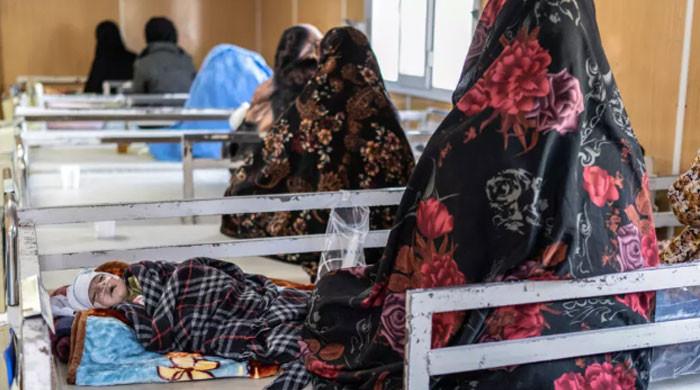 Afghan mothers seek hospital help for malnourished children