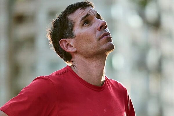 Alex Honnold's rope-free climb up Taipei 101 skyscraper underway after weather delay