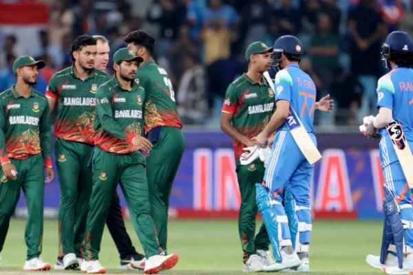 indian players shubman gill and kl rahul shake hands with bangladesh players after an icc men s champions trophy match in dubai uae feb 20 2025 reuters