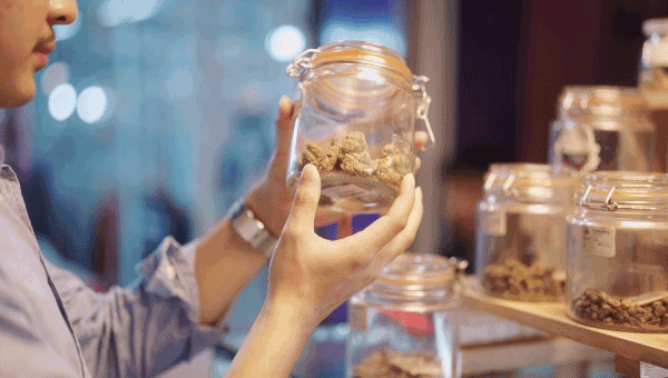 Man buying cannabis - health effects