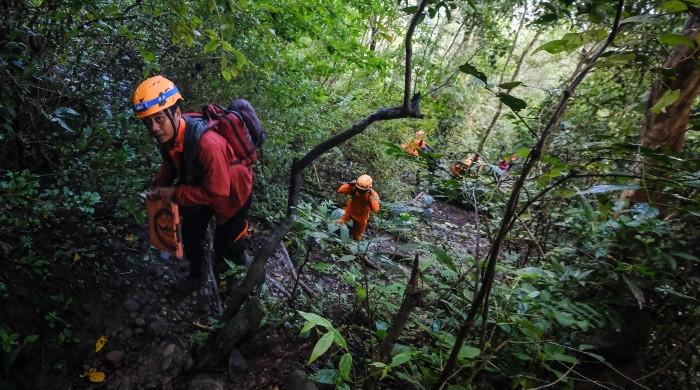 Indonesian authorities find wreckage of missing surveillance plane with 11 on board