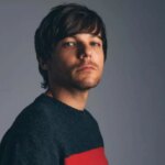 Louis Tomlinson dodges Zayn Malik talk while praising Harry, Niall