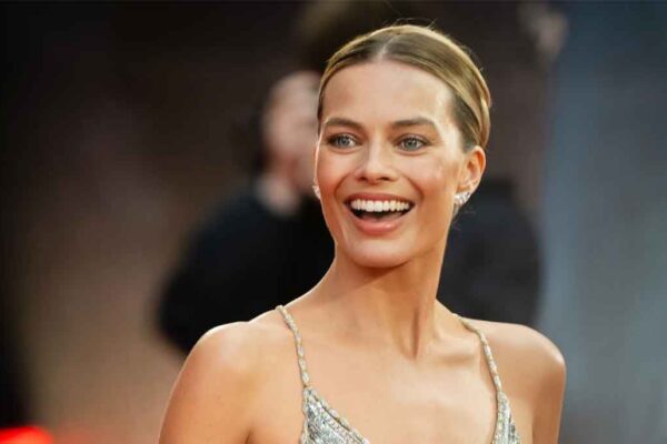 Margot Robbie nods to Victoria Beckham as she promotes