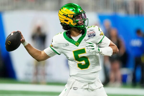 Oregon quarterback Dante Moore forgoes NFL Draft as likely top selection to stay in school