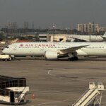 Passengers baffled and confused after screams burst from beneath taxiing Air Canada plane