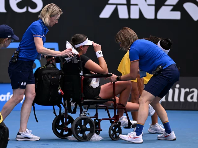 canada s marina stakusic is assisted onto a wheelchair after retiring from her first round match against australia s priscilla hon photo reuters