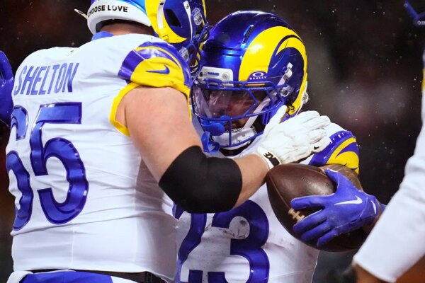 Rams withstand Caleb Williams' heroic touchdown to stun Bears in overtime, move on to NFC title game