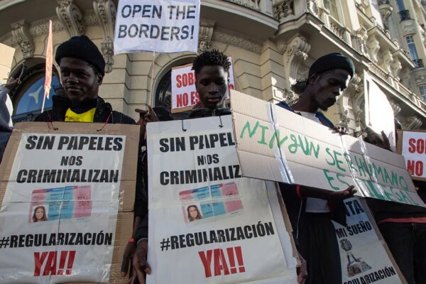 Spain legalizes up to 500,000 undocumented migrants, sparking backlash