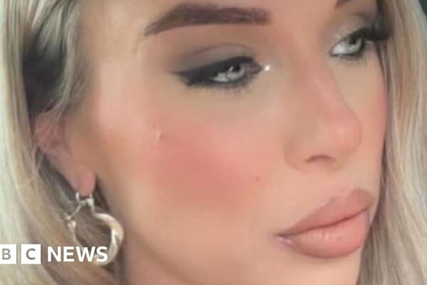 Tameside woman 'took own life after benefits cut in error' - coroner