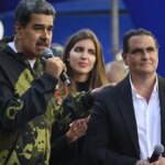 Venezuela interim leader sacks industry minister allied with ousted president Maduro
