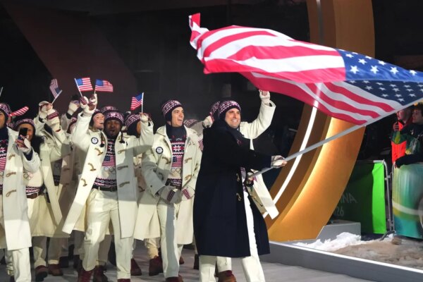 As Winter Olympics begin in Italy, some Team USA athletes speak out about politics at home