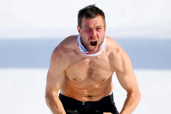 Austrian snowboarder strips down in cold temperatures during wild celebration after winning Olympic gold