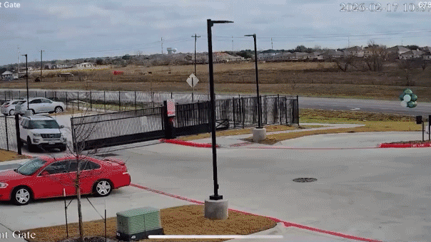 A man was seen running after a repossessed car, opening fire.