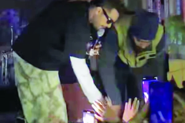 screengrab from a video posted online shows asim azhar s moment with a bouncer during a concert in karachi photo facebook pakistani cinema