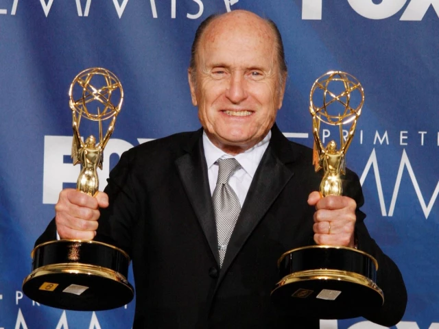 actor robert duvall holds the two emmy awards he won as outstanding lead actor in a mini series or movie for broken trail and as executive producer for broken trail which won for outstanding mini series at the 59th primetime emmy awards in los angeles california september 16 2007 photo reuters