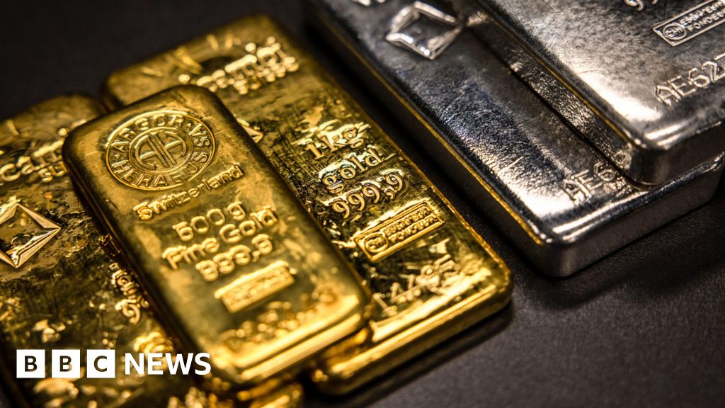 Gold and silver prices fall but FTSE 100 hits record high