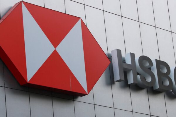 HSBC annual pre-tax profit drops over 7%, revenue jumps as bank's results top estimates