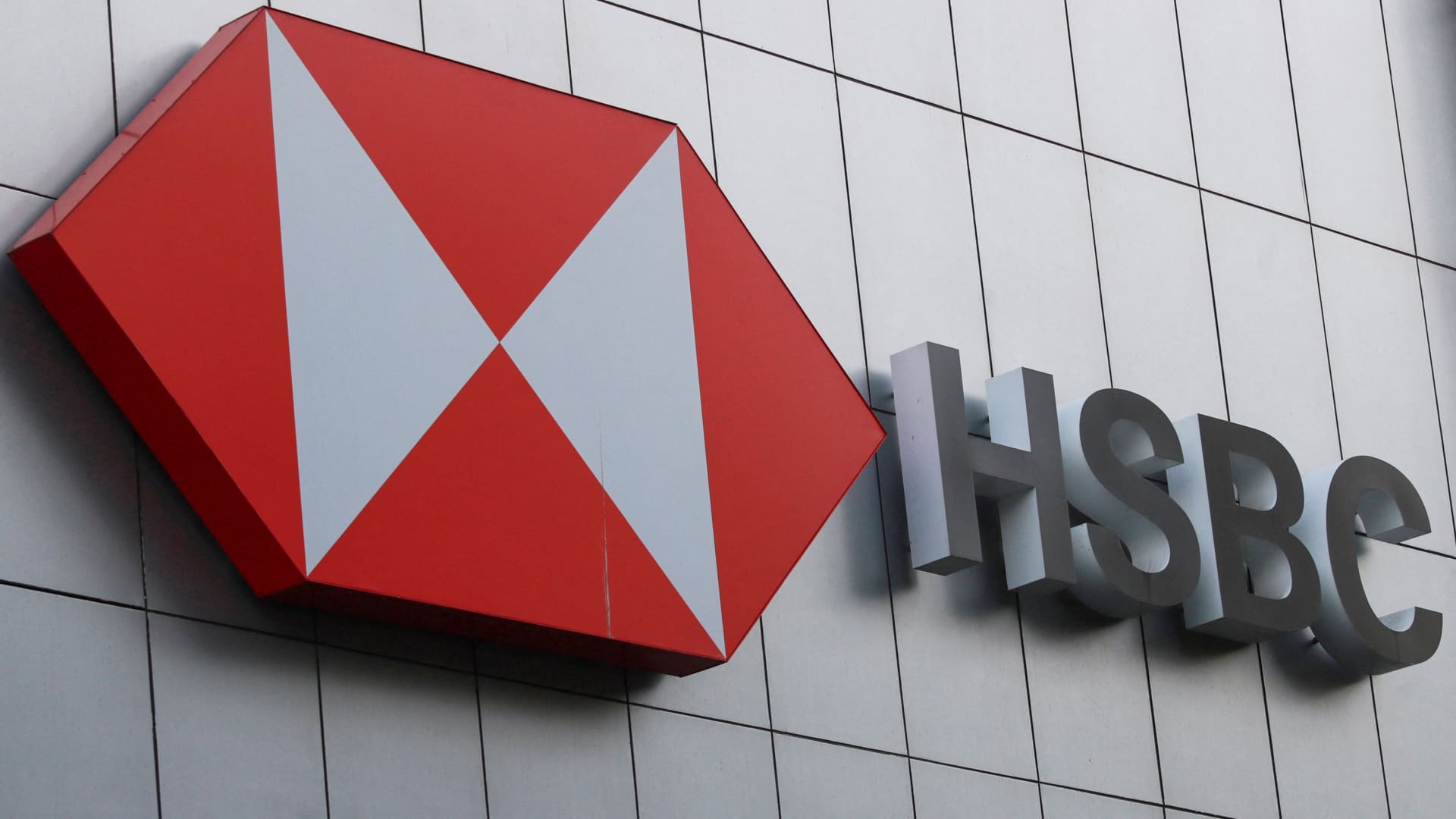 HSBC annual pre-tax profit drops over 7%, revenue jumps as bank's results top estimates