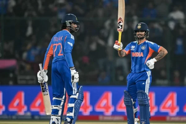 india s ishan kishan celebrates after scoring a half century during the 2026 icc men s t20 cricket world cup group stage match between india and namibia at the arun jaitley stadium in new delhi on february 12 2026 photo afp