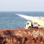 Iran fires live missiles into Strait of Hormuz as Trump envoys arrive for nuclear talks