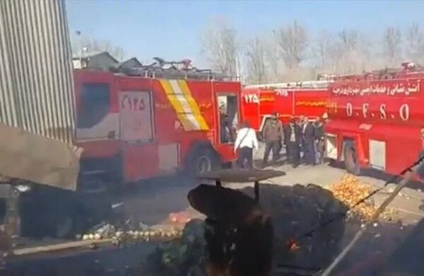 Iranian military helicopter crashes into fruit market, four dead