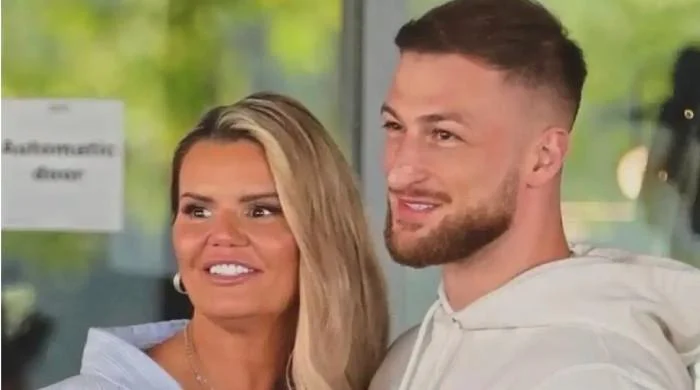 Kerry Katona enjoys romantic beach stroll with boyfriend Paolo in Dubai