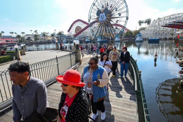 Measles exposure risk identified at major airport and theme park, health officials warn