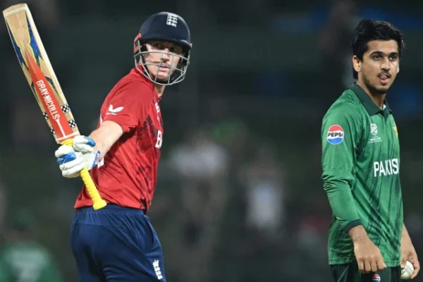 england captain harry brook l celebrates his half century 50 runs as pakistan s saim ayub r looks on during the 2026 icc men s t20 cricket world cup super eights match between england and pakistan at the pallekele international cricket stadium in kandy on february 24 2026 photo afp