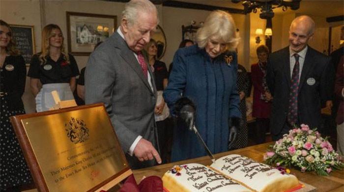 Queen Camilla 'scolds' King Charles during cake cutting