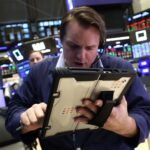 S&P 500 rises in volatile trading after Supreme Court knocks down Trump’s emergency tariffs: Live updates