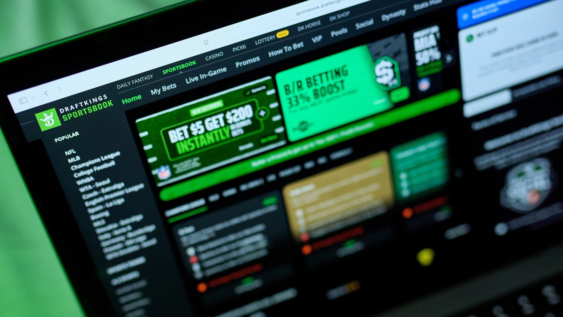 Stocks making the biggest moves premarket: DraftKings, Applied Materials, Roku, Rivian Automotive and more