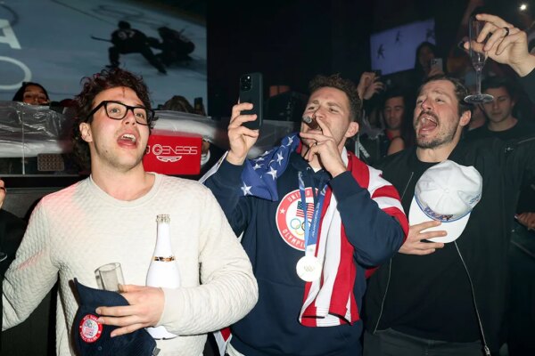 Team USA men's hockey players sing national anthem while partying at famous Miami nightclub