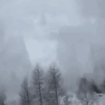 Video shows terrifying moment avalanche slams into passenger train near ski resort