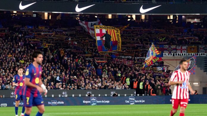 Barcelona welcome more fans, singing section back to Camp Nou