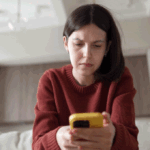 Woman worried using cell phone