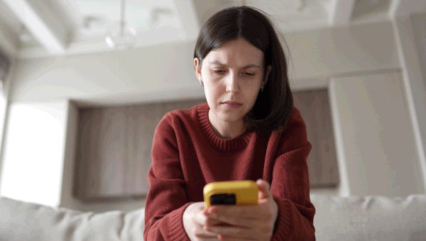 Woman worried using cell phone