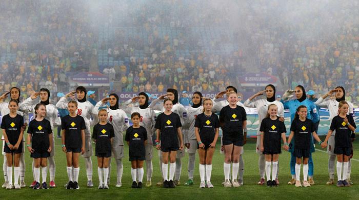 Iran players salute and sing national anthem at Women's Asian Cup