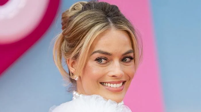 Margot Robbie stuns in new hairstyle during Paris Fashion Week