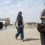 Pakistanis at remote border describe scramble to leave Iran