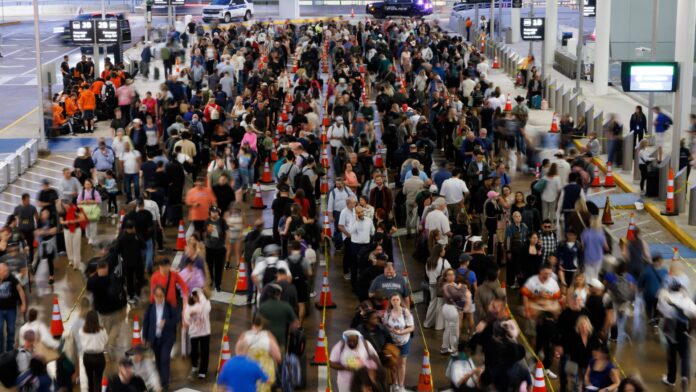 Pricy airfare, airport chaos test travelers' willingness to fly this year