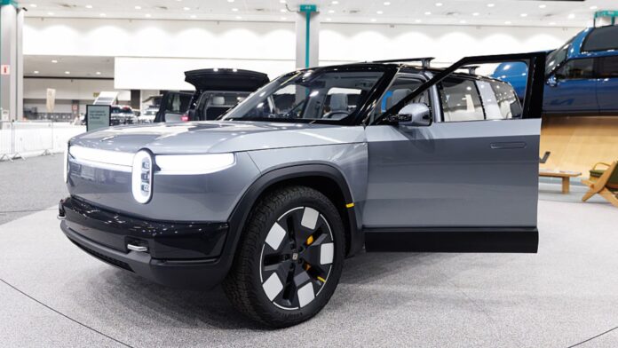 Uber to invest up to $1.25 billion in EV maker Rivian in deal to launch 50,000 robotaxis