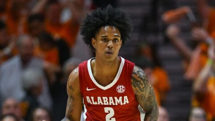 Alabama's Holloway plans to enroll in fall, aims to rejoin team