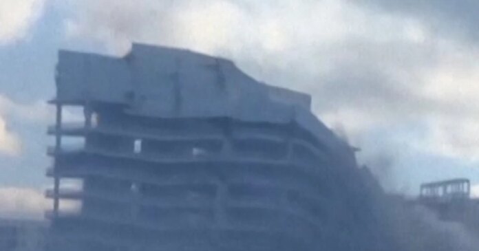 Controlled demolition takes down Miami hotel in seconds