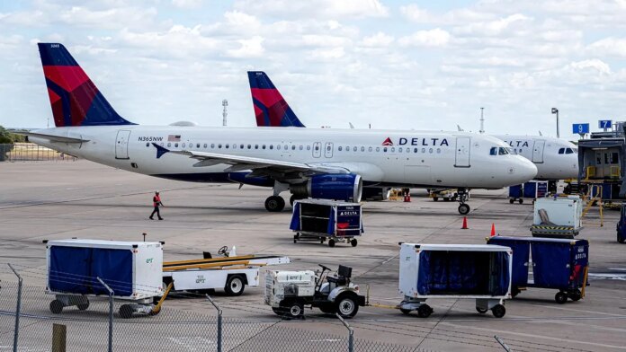 'Get off the plane,' Delta passengers chant at flyer who refuses to hang up phone